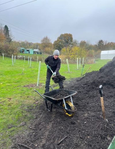 David Marshall shovels fresh soil